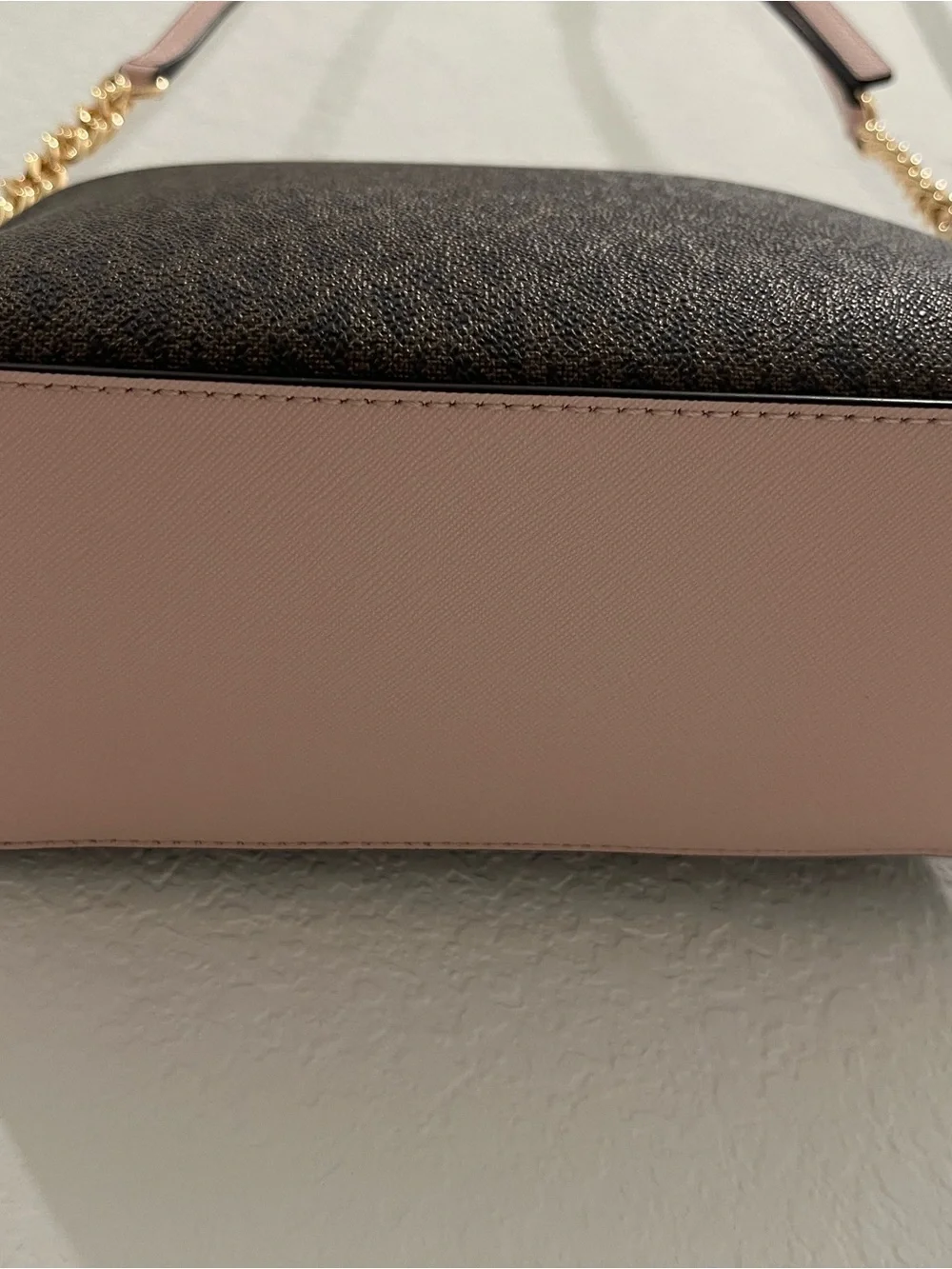 Michael Kors Brown Monogram Crossbody with Pink Trim and Gold Chain Brand new .